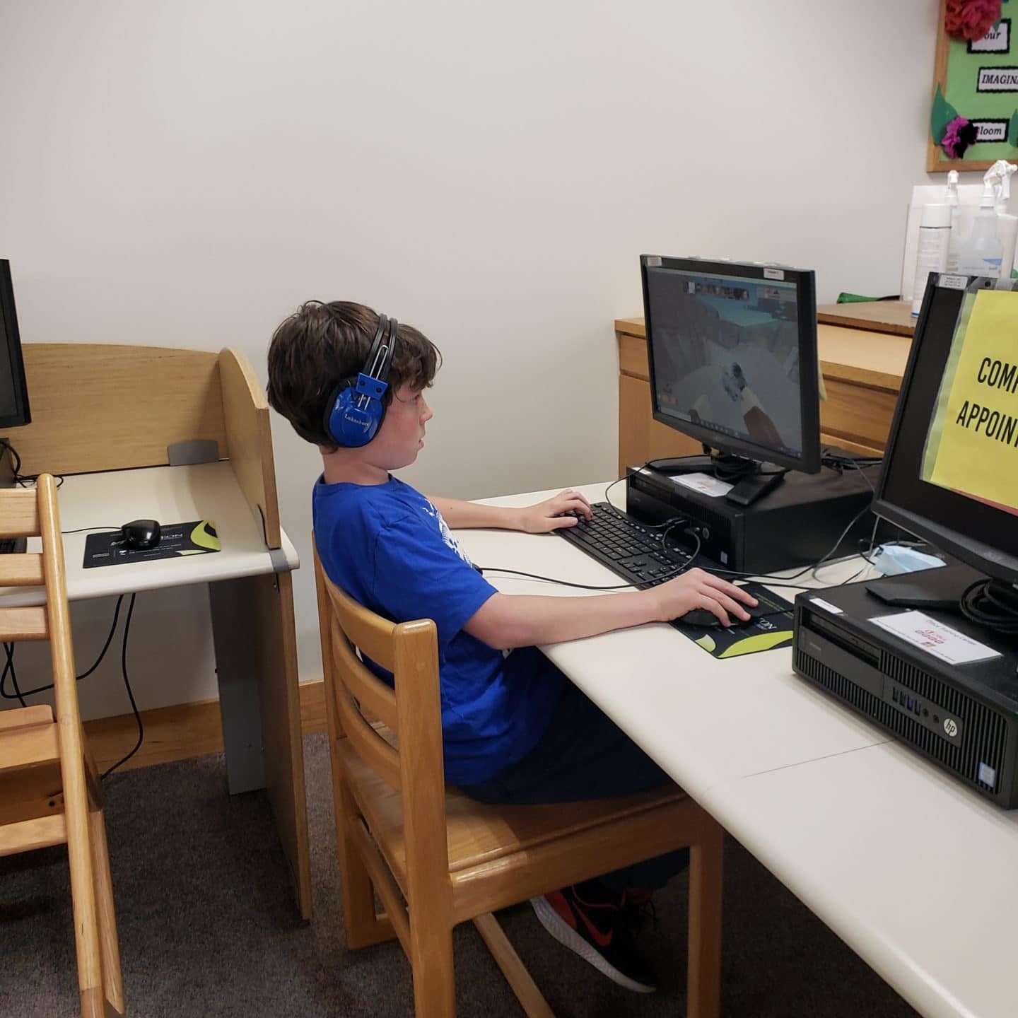 Child on Computer at the Library